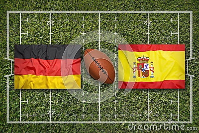Germany vs. Spain flags on rugby field Stock Photo