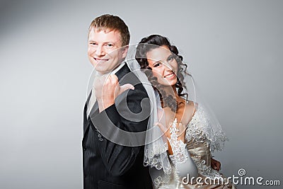 Gesticulating bride and groom Stock Photo