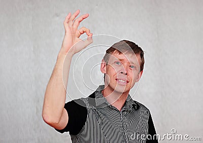 The gesture of an attractive man. Stock Photo