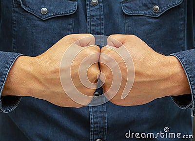 Gesture symbol with hands two fists collide, means collision, counter Stock Photo