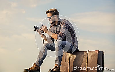 get away. sexy man touristic reporter. macho man with camera on baggage. capture adventure. journalist. photographer in Stock Photo