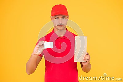 Get free discount card. Delivered to your destination. Service delivery. Courier and delivery. Postman delivery worker Stock Photo