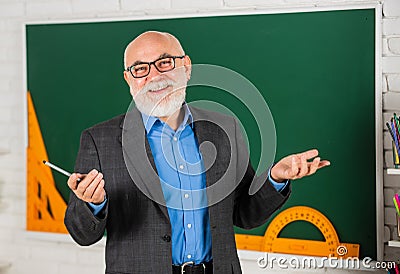 Get good results. bearded tutor in glasses. back to school. protractor ruler. learn geometry easily. become good at math Stock Photo