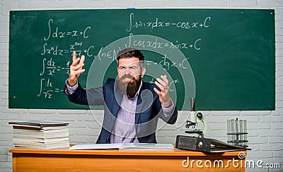 Get out of class. School principal threatening with punishment. Teacher strict serious bearded man chalkboard background Stock Photo