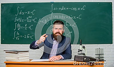 Get out of class. Teacher strict serious bearded man chalkboard background. Teacher looks threatening. Rules of school Stock Photo