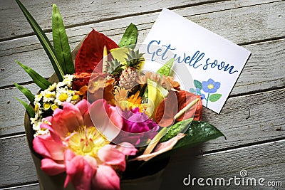 Get well soon message with bouquet Stock Photo