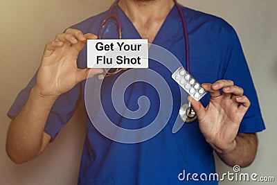 Get Your Flu Shot male doctor prescribes prescription for pills Stock Photo