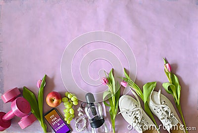 Getting fit, reducing weight and workout in the springtime and summer, flat lay with fitness items and tulip flowers Stock Photo