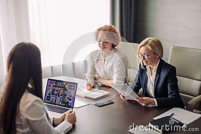 Getting a new job concept. Job interview with woman applicant in office. Stock Photo