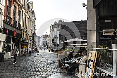 People in a bar on a street in Ghent, Belgium Editorial Stock Photo