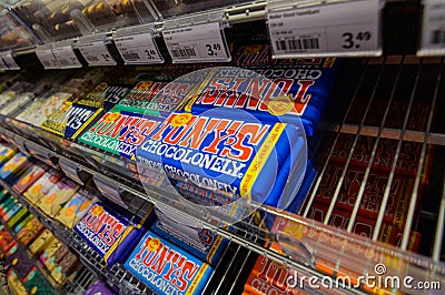 Ghent, Belgium, August 2019. Whole exhibitors dedicated to the Belgian specialty: chocolate at a supermarket. The packaging Editorial Stock Photo