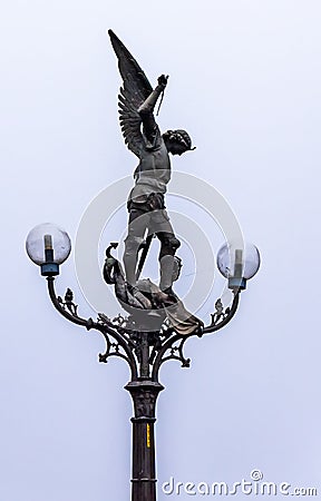 Beautiful gothic lantern with a bronze statue of St Michael Editorial Stock Photo