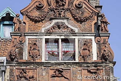 Relief of decorative facade of historic tenement house at Kraanlei street, Ghent, Belgium Editorial Stock Photo