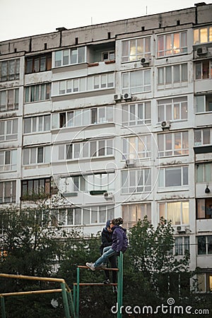 Ghetto architecture the collapse of the Soviet Union. Echo of the USSR. Country high-rise houses in the evening in Obolon district Editorial Stock Photo