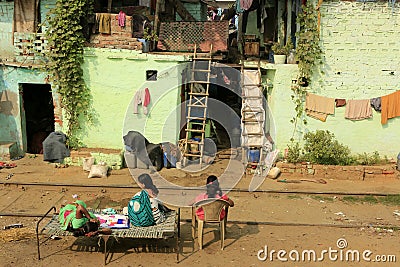 Ghetto and slums in Delhi India.These unidentified people live in a very difficult conditions on the ghettos of the city Editorial Stock Photo
