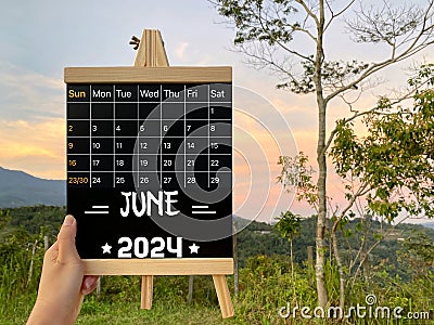 June 2024 calendar with nature background. Stock photo. Stock Photo