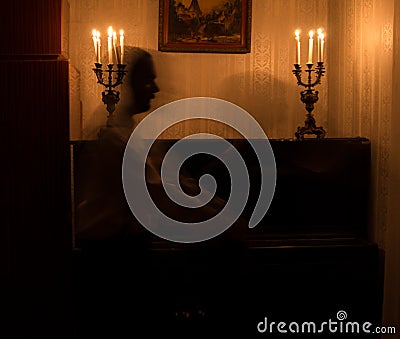 Ghost couple dancing in room Stock Photo