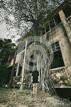 Ghost in haunted house, Mysterious murdered woman ghost, Horror scene of scary abandoned factory Stock Photo