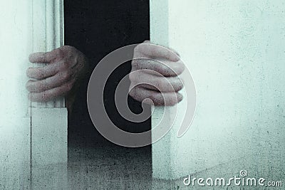 Ghostly transparent blurred hands opening a door. With a grunge, out of focus weathered edit Stock Photo