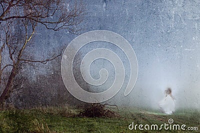A ghostly woman in a white dress. On the edge of a dark spooky forest. With an old artistic vintage edit Stock Photo