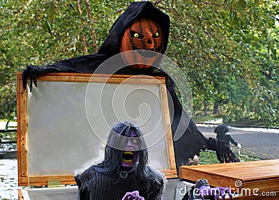 Ghoulish figures displayed during Halloween Stock Photo