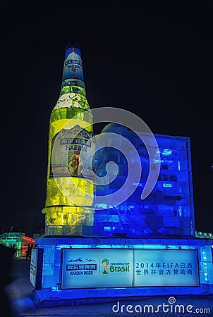 Giant advertising bottle of Chinese brand of beer at Harbin Ice & Snow World Festival Editorial Stock Photo