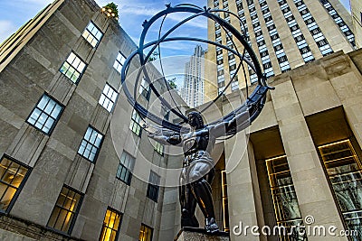 The giant Atlas holding the planet earth as a punishment from the gods, on Fifth Avenue in the Big Apple. It is the avenue. Editorial Stock Photo