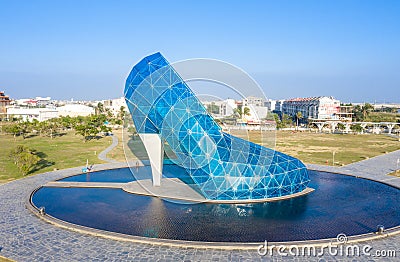 A giant blue glass wedding church shaped like a high-heeled shoe in Taiwan Chiayi, aerial view. Time-lapse photography. Editorial Stock Photo