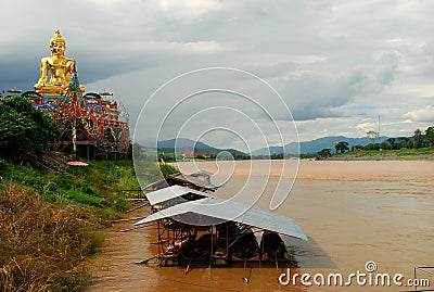Giant Buddha near Mekong river at Golden Triangle. Sop Ruak, Thailand Stock Photo