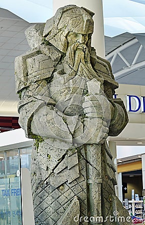 Giant carved stone dwarf from set Lord Rings at Auckland Airport Editorial Stock Photo