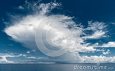 Giant cloud above the sea Stock Photo