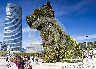 The giant floral sculpture Puppy in Guggenheim Editorial Stock Photo
