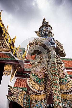 Giant gate keeper of the Royal Palace in Bankok Stock Photo