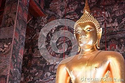 Giant golden Buddha statue front Thai acient art living style in Buddhist temple., Bangkok, Thailand Stock Photo