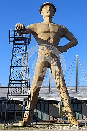 Giant Golden Driller Statue and landmark of oilfield worker and oil derrick near Route 66 in Tulsa Oklahoma Stock Photo