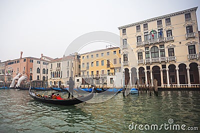 Giant hands rise from the water of the Grand Canal to support th Editorial Stock Photo