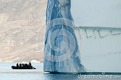 Giant Iceberg with Inflatable Boat Scale Editorial Stock Photo