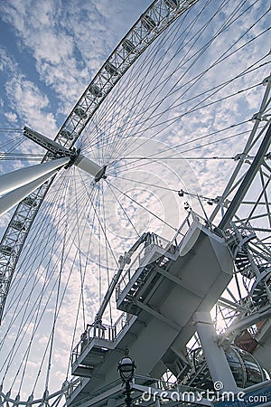 Giant iron wheel with a cloudy sky at the background wellknown as London Eye Editorial Stock Photo