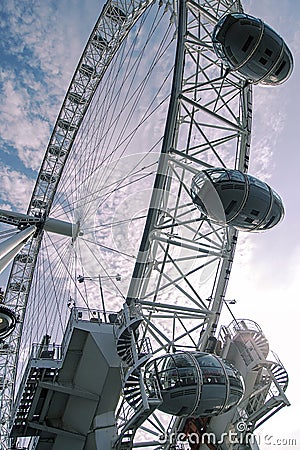 Giant iron wheel with a cloudy sky at the background wellknown as London Eye Editorial Stock Photo