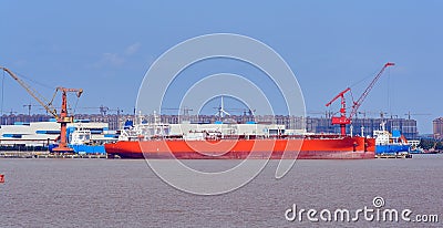 Giant new building gas tankers on shipyard. Stock Photo