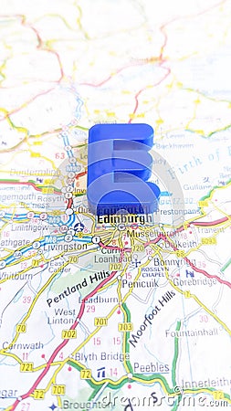 A giant plastic letter E spelling Edinburgh on a map of Scotland portrait Stock Photo