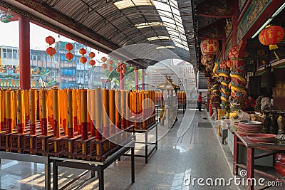 Giant Red and Gold Candles Lighted on an Altar chinese temple sh Editorial Stock Photo