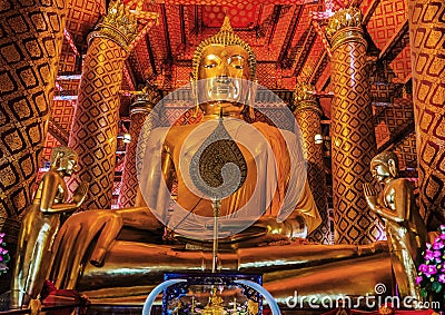 Giant sitting buddha Wat Phanan Choeng temple Ayutthaya bangkok Stock Photo