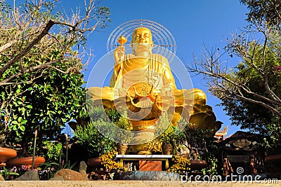 Giant sitting golden Buddha.,Dalat, Vietnam Stock Photo