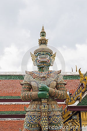 Giant statue at Wat Phra Kaew, Temple of the Emerald Buddha, Bangkok, Thailand Stock Photo