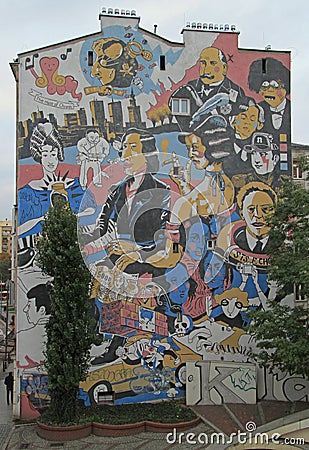 Giant street art murals on building walls in Warsaw, Poland. Editorial Stock Photo