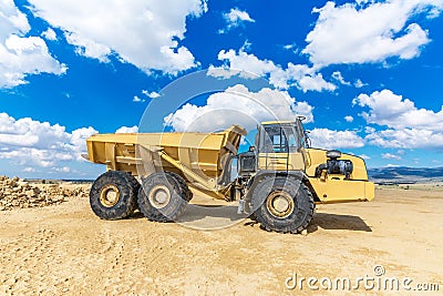 Giant truck in a mine or quarry to transport large loads Stock Photo