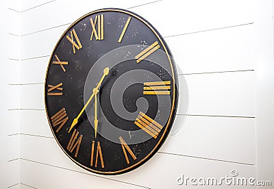 Giant Wall Clock In Entry Hallway Stock Photo