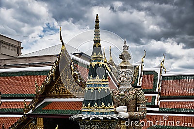 Giant Yak, Yaksha statue with large teeth, piercing eye with sword in hand protecting and guarding the famous Temple of the Stock Photo