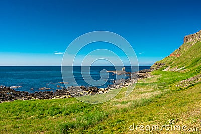 Giants Causeway Aerial view most popular and famous attraction in Northern Ireland.Hills on Coast of Atlantic ocean, summer time Stock Photo